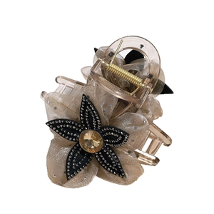 Champagne mesh flower hair claw clip with amber gemstone and rhinestone accents