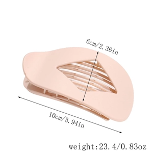 Dimensions de la pince à cheveux ovale plate montrant 10cm de long et 6cm de haut