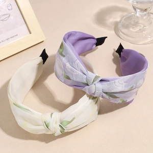 Set de diademas con nudo y estampado floral para un peinado elegante retro