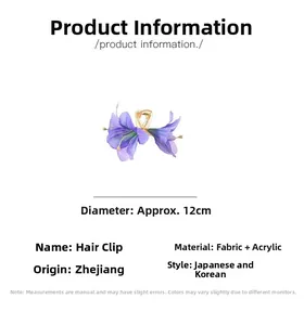 Detail of purple fabric lily hair claw clip with 12cm diameter and gold accents