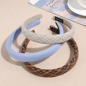 Three-piece set of elegant plaid fabric headbands in blue, grey and orange colors