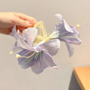 Elegant purple lily flower hair claw clip with silk texture for women's hairstyling