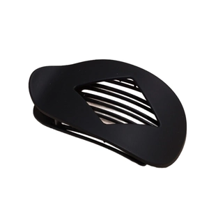 Pince à cheveux ovale plate noir mat avec design incurvé et motif triangulaire ajouré