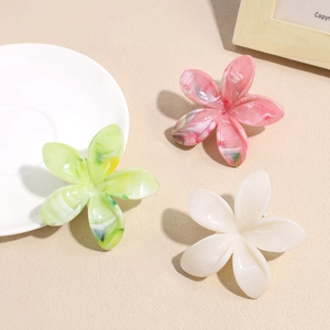 Elegant gradient five-petal flower hair claws in pink, green, and cream marble finish
