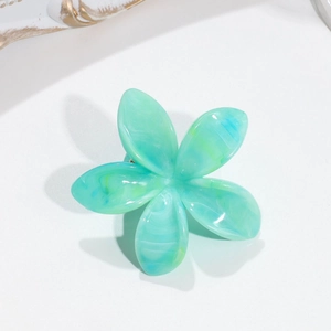 Close-up of mint green marble pattern five-petal flower hair claw clip on white background