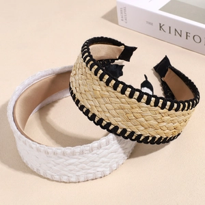 Bohemian wide knotted straw headband in white and natural tones for a summer beach look