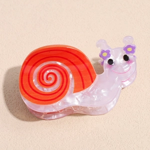 Detailed view of a pink cartoon snail hair claw clip with colorful resin accents