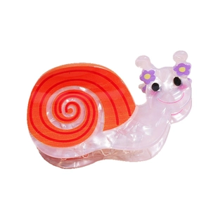 Cute pink snail hair claw clip with orange spiral shell and purple flowers for women