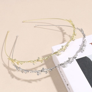 Vintage gold and silver leaf headband with rhinestones and opals for elegant bridal style