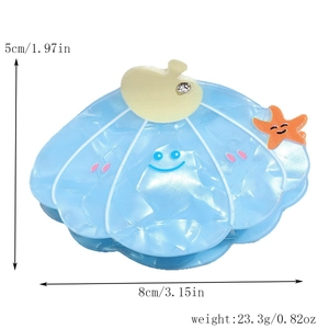 Blue acetic acid shell hair claw clip with starfish detail and size measurement 8x5cm