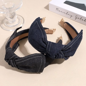 Set of two denim knot headbands in navy and black with contrast white stitching