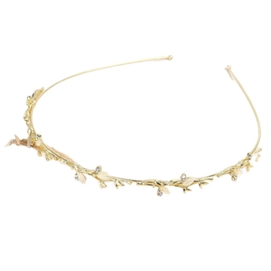 Vintage golden leaf headband with rhinestones and white petals for bridal hair styling