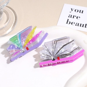 Acrylic book-shaped hair claw clips with marble texture and colorful gradient pages