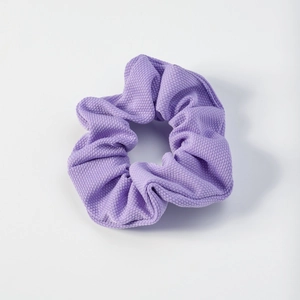 Summer lavender purple bow hair scrunchie with knit honeycomb texture on white background