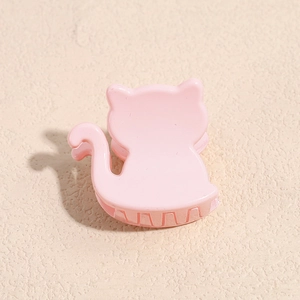 Minimalist pink cat shaped hair claw clip for high ponytail styling and elegant hair fix