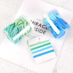 50-piece set of gradient blue and green high-elastic seamless hair ties in clear jars
