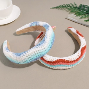 Knitted floral headband with bohemian crochet texture and soft velvet lining