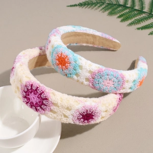Handmade crochet floral headband set with colorful daisy patterns and soft non-slip lining