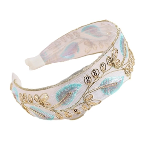 Elegant wide headband with leaf embroidery and golden sequins on ivory mesh fabric