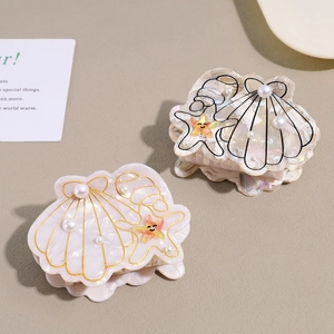 Ensemble de pinces à cheveux élégantes en perles, coquillages et étoiles de mer