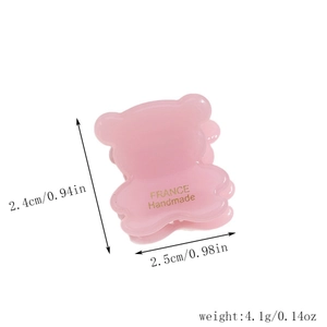 Detailed dimensions of a pink bear hair claw clip featuring golden handmade lettering