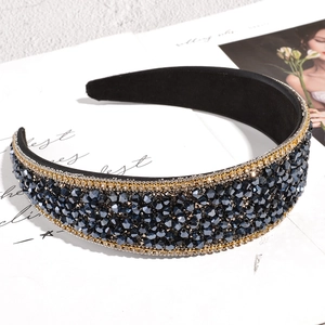 Luxurious wide headband with navy crystals and gold rhinestones on black velvet