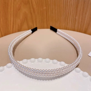Serre-tête élégant à double rangée de perles blanches avec embouts en tissu noir doux