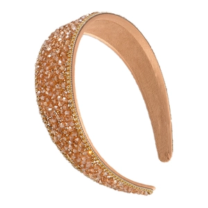 Luxurious vintage wide headband with sparkling champagne rhinestones on a beige fabric base