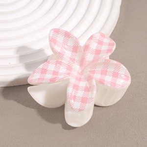Flower hair claw clip with pink houndstooth pattern on cream resin finish
