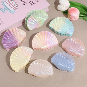 Set of 8 iridescent shell-shaped hair claws in pastel colors with pearlescent finish