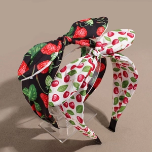 Set of two fabric headbands with bow design in strawberry black and cherry white prints