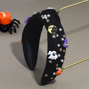 Detail of Halloween knot headband featuring ghosts, pumpkins, pearls and crystals