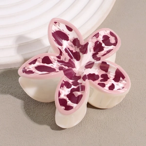 Pince à cheveux fleur blanc crème avec bords roses et motifs léopard violets