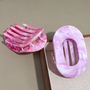 Pinces à cheveux élégantes à motif marbré rose et violet pour des coiffures chic