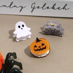 Halloween mini hair clips set featuring cute ghost, pumpkin and spider web designs