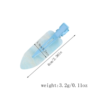 Detail showing 6cm x 1.9cm light blue glitter acetate hair clip with dimensions