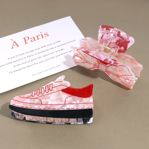 Pink marble acrylic hair claw clips in bow and creative sneaker shapes for women