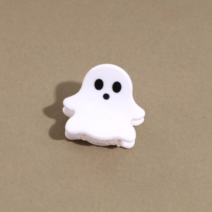 Close-up of a cute white cartoon ghost hair claw clip for Halloween party hair styling