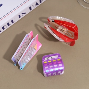 Molla per capelli creativa in acetato rosso marmorizzato e a forma di calcolatrice