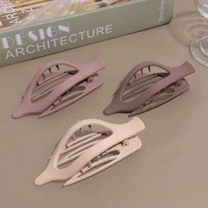 Three-piece matte hair claw clip set in Morandi colors with hollow leaf design