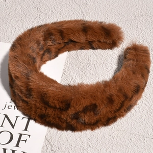 Plush brown leopard print headband in vintage faux fur for winter hair styling