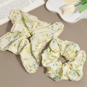 Floral scrunchie set with yellow blossom print and delicate white lace trim
