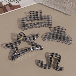 Blue gingham pattern hair claw clip set with rectangle and star shaped acrylic designs