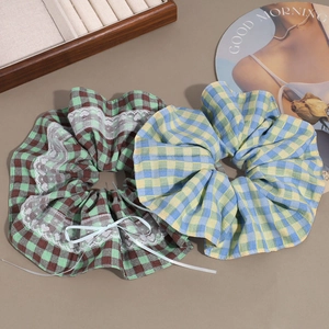 Plaid scrunchie with lace trim and bow in retro brown green and blue yellow colors