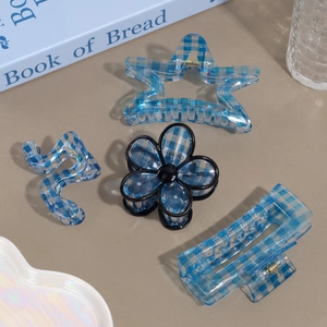 Blue checkerboard hair claw set featuring star flower and rectangle wave shapes