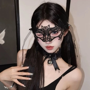 Detailed close-up of intricate black lace bat mask and matching bell choker necklace