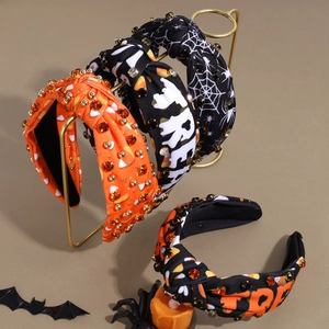 Cerchietti annodati per Halloween con strass e decorazioni a ragnatela alla moda