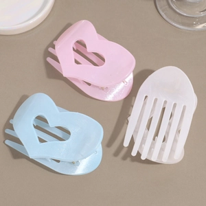 Set di tre mollette per capelli a forma di cuore con finitura perlata in colori pastello
