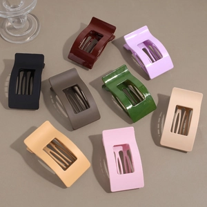 Flat hair claw clips set in 8 matte colors with rectangular cutout design and curved teeth