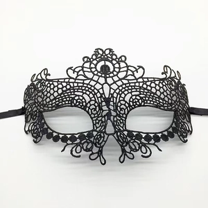 Detailed view of black lace fox mask with intricate embroidery and ribbon ties for Halloween